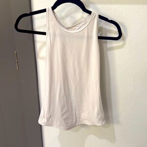 Lululemon fast and free white, ribbed racer back tank.  Women’s size 4.
